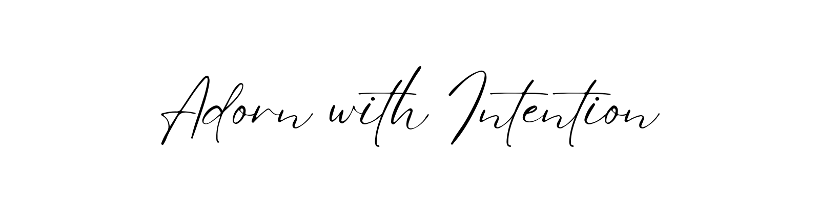 Text 'Adorn with Intention' in a cursive font on a white background