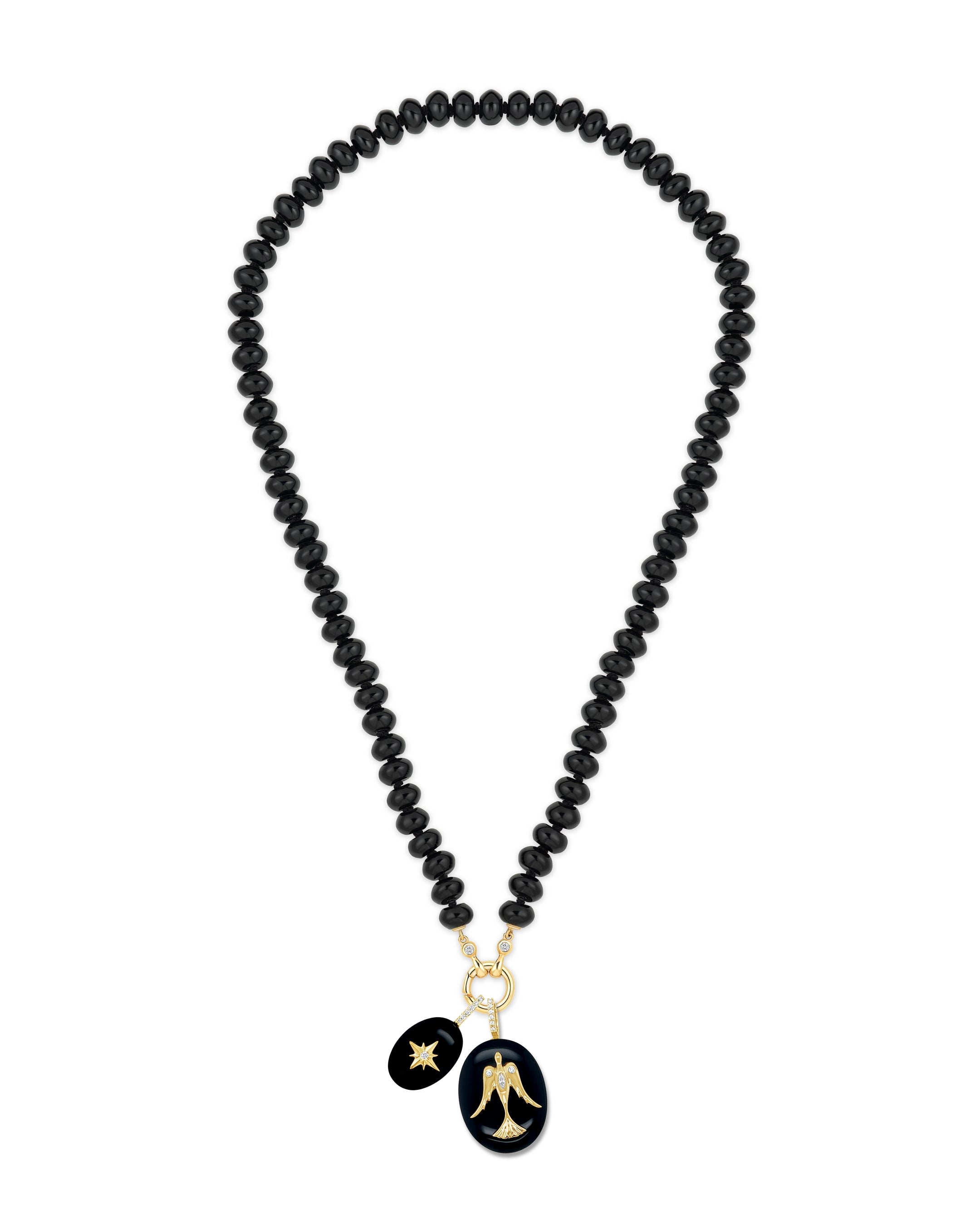 Alternate view of Black Onyx cabochon pendant with gold starburst on white background