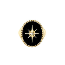 Load image into Gallery viewer, Black Onyx Starburst Signet Ring angled view with 14k gold band and diamond starburst detail on white background