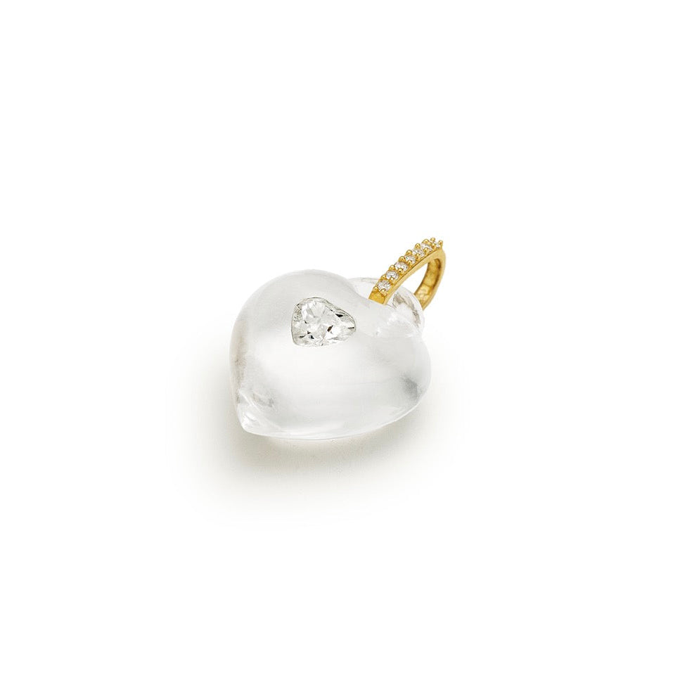 Clear heart-shaped pendant with gold accents on a white background