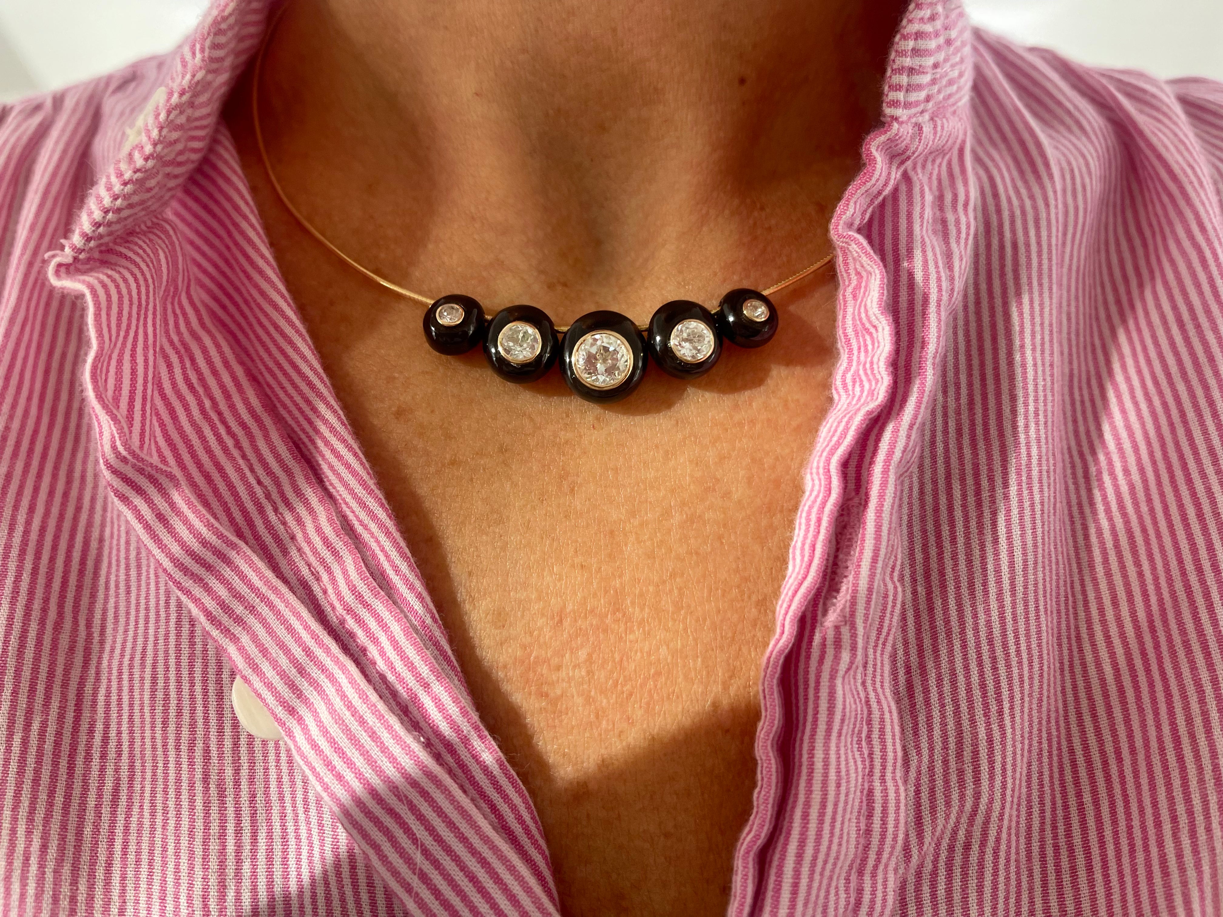 Gold necklace with black onyx & white topaz beads