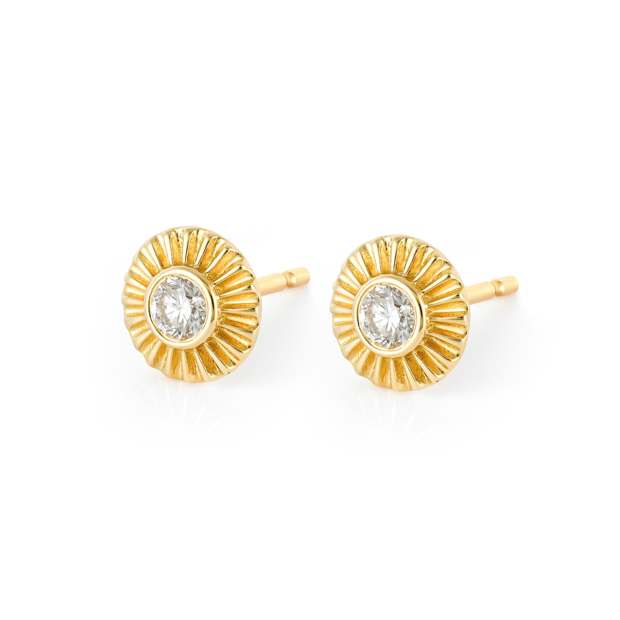 Petite 14k gold Clarity Stud Earrings with central diamond and radiating sunburst detail.