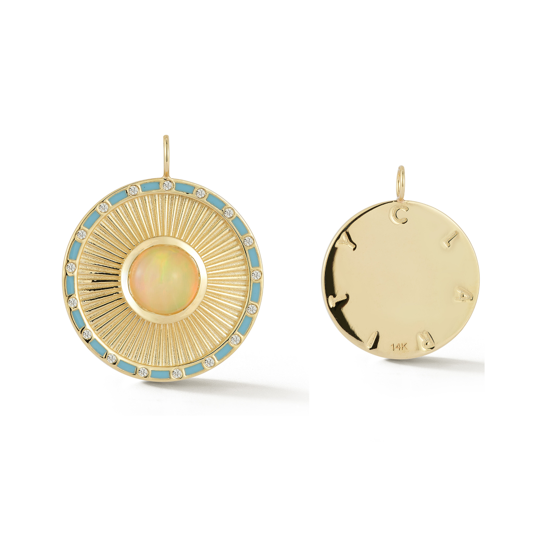 Front and back view of the Clarity Pendant in 14k gold with opal center and sunburst detailing, including engraved “Clarity” reverse side.