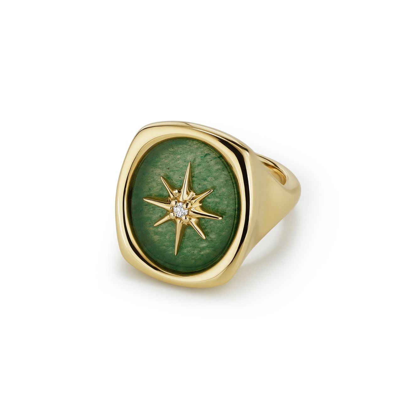 A 14k gold ring with polished oval of Green Aventurine, set with a gold starburst accented by a single diamond