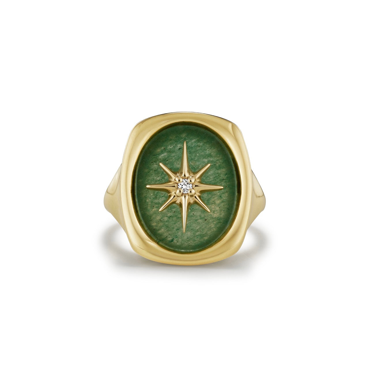 A 14k gold ring with polished oval of Green Aventurine, set with a gold starburst accented by a single diamond