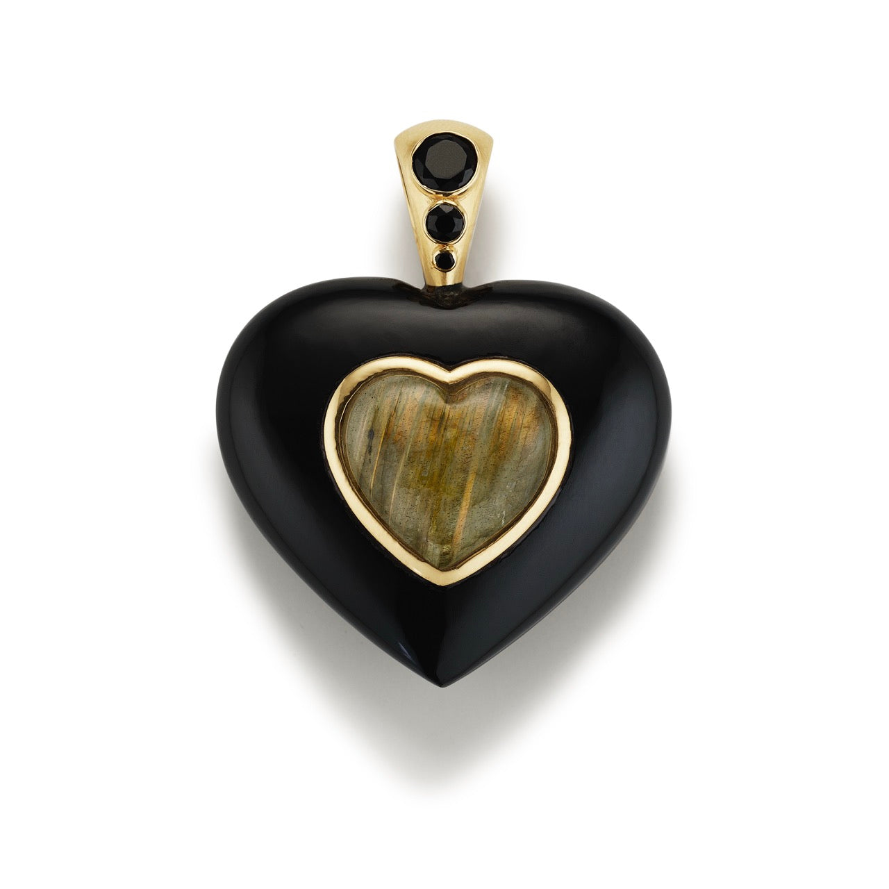Black heart-shaped pendant with gold heart inset and black stones on a white background