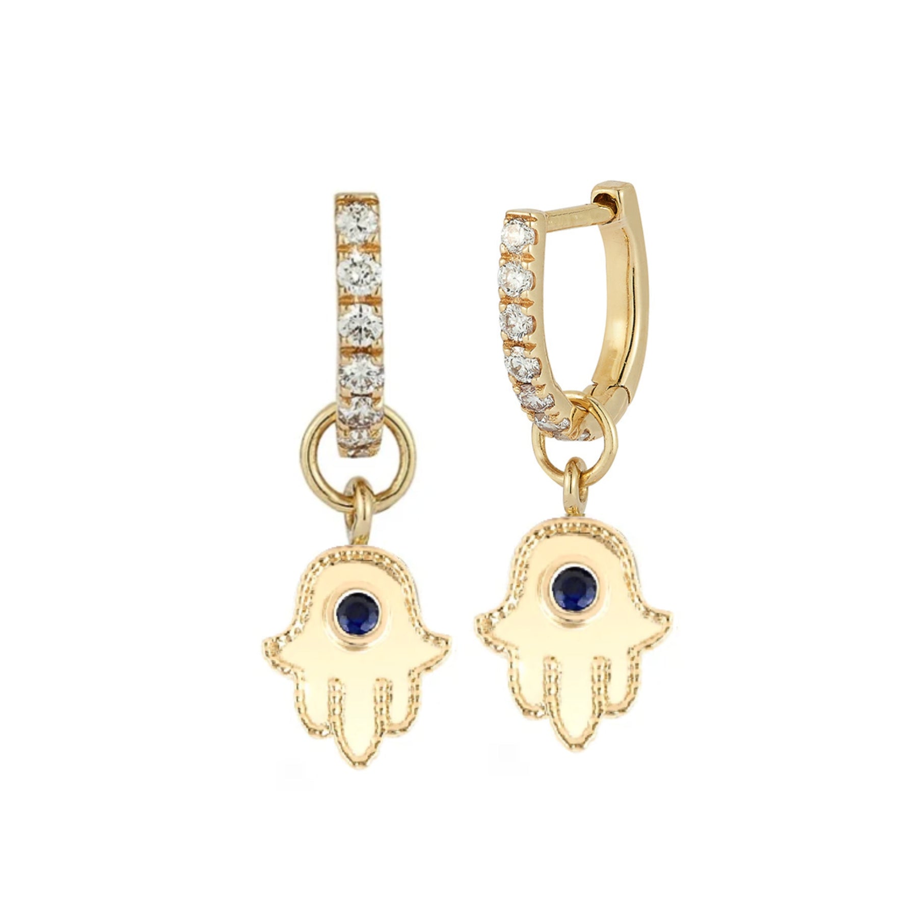Gold hamsa hand earrings with blue stones on a white background