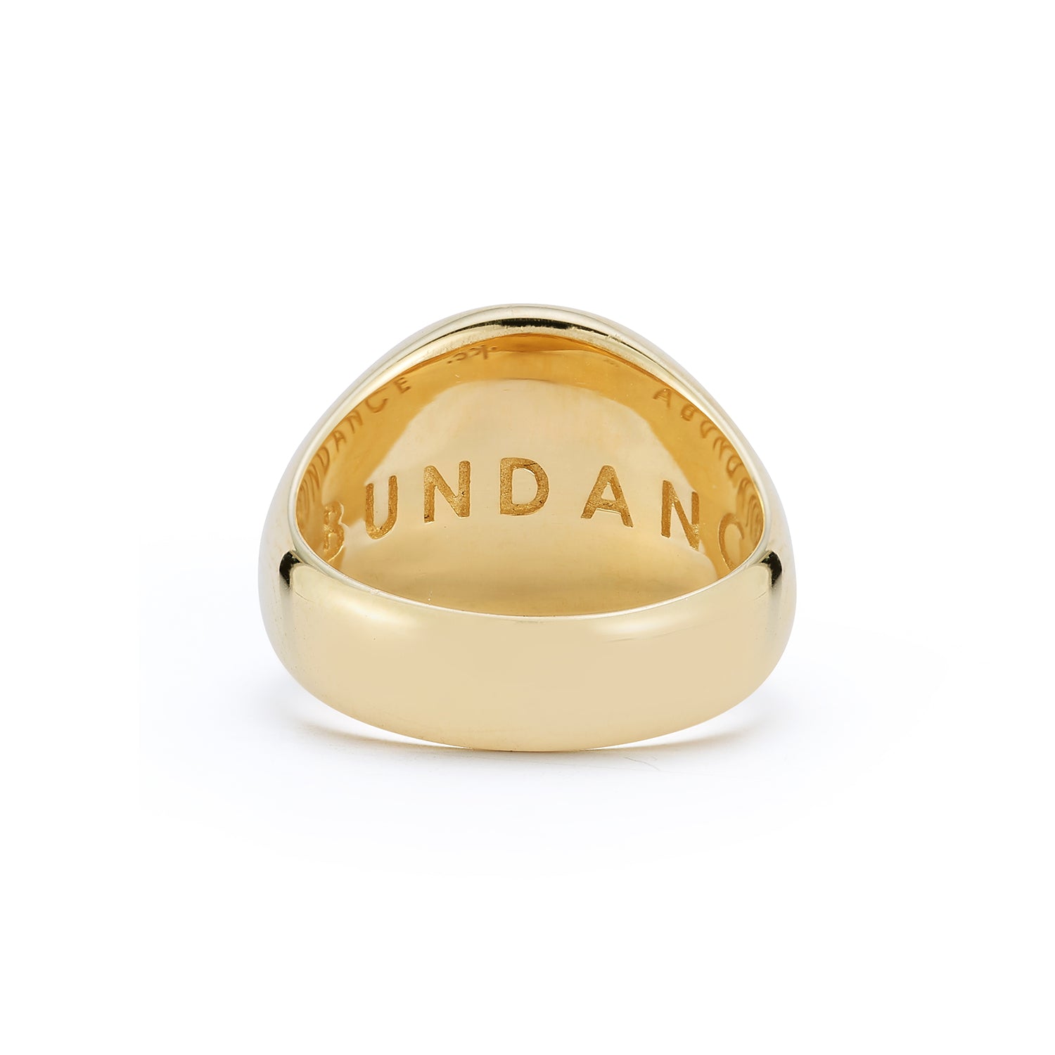 Inside view of the Abundance Signet Ring showing engraved “ABUNDANCE” lettering