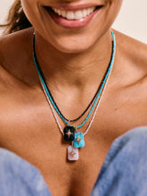 Load image into Gallery viewer, Black Onyx Emerald Cut Cabochon Starburst Pendant
