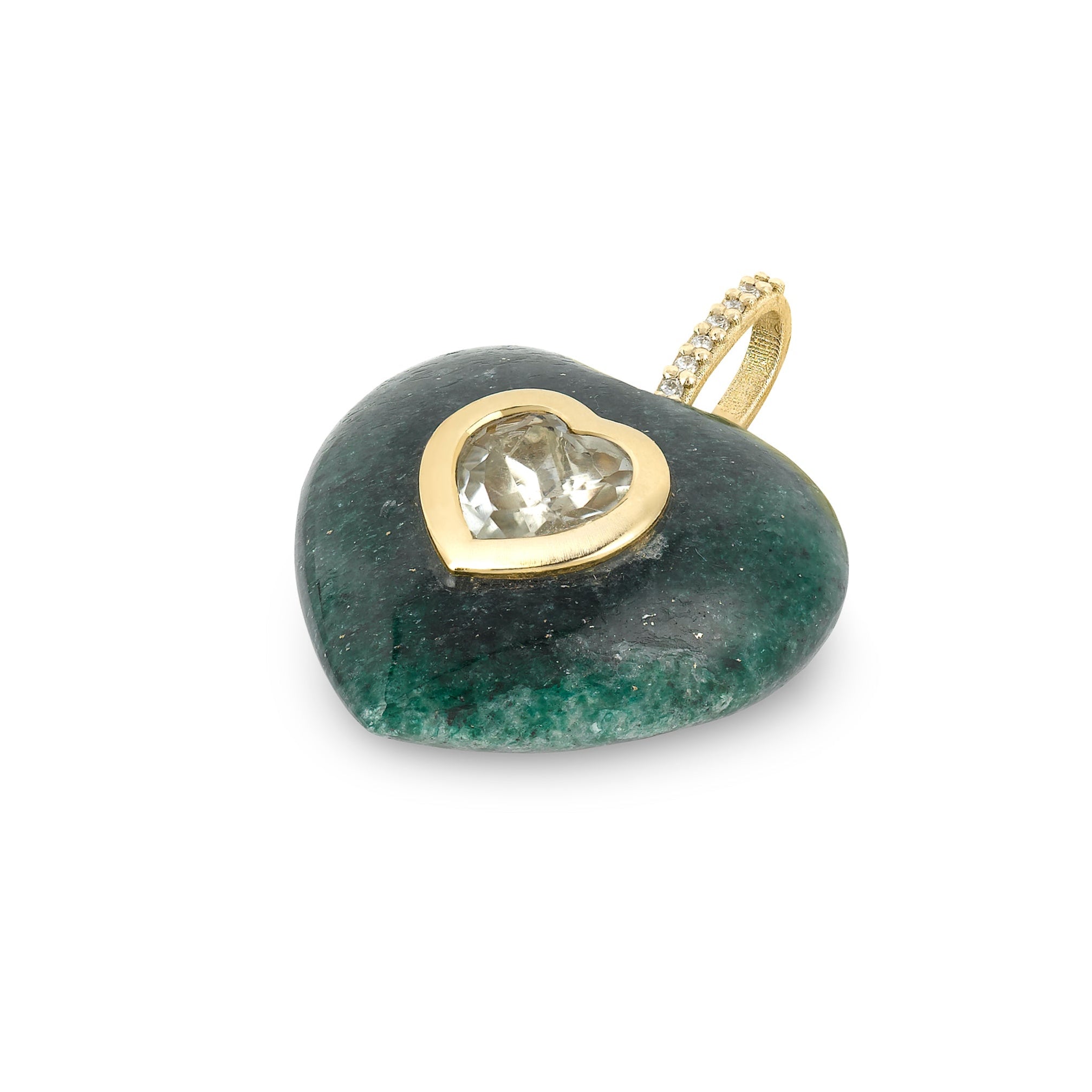 Heart-shaped pendant with green stone and gold heart laying on a white background
