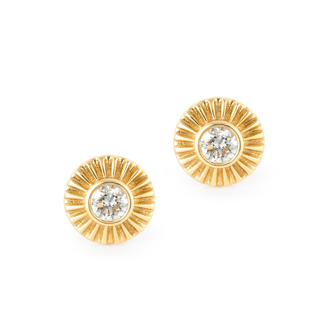 Clarity Studs in 14k gold with diamond sunburst design shown as a pair on white background.