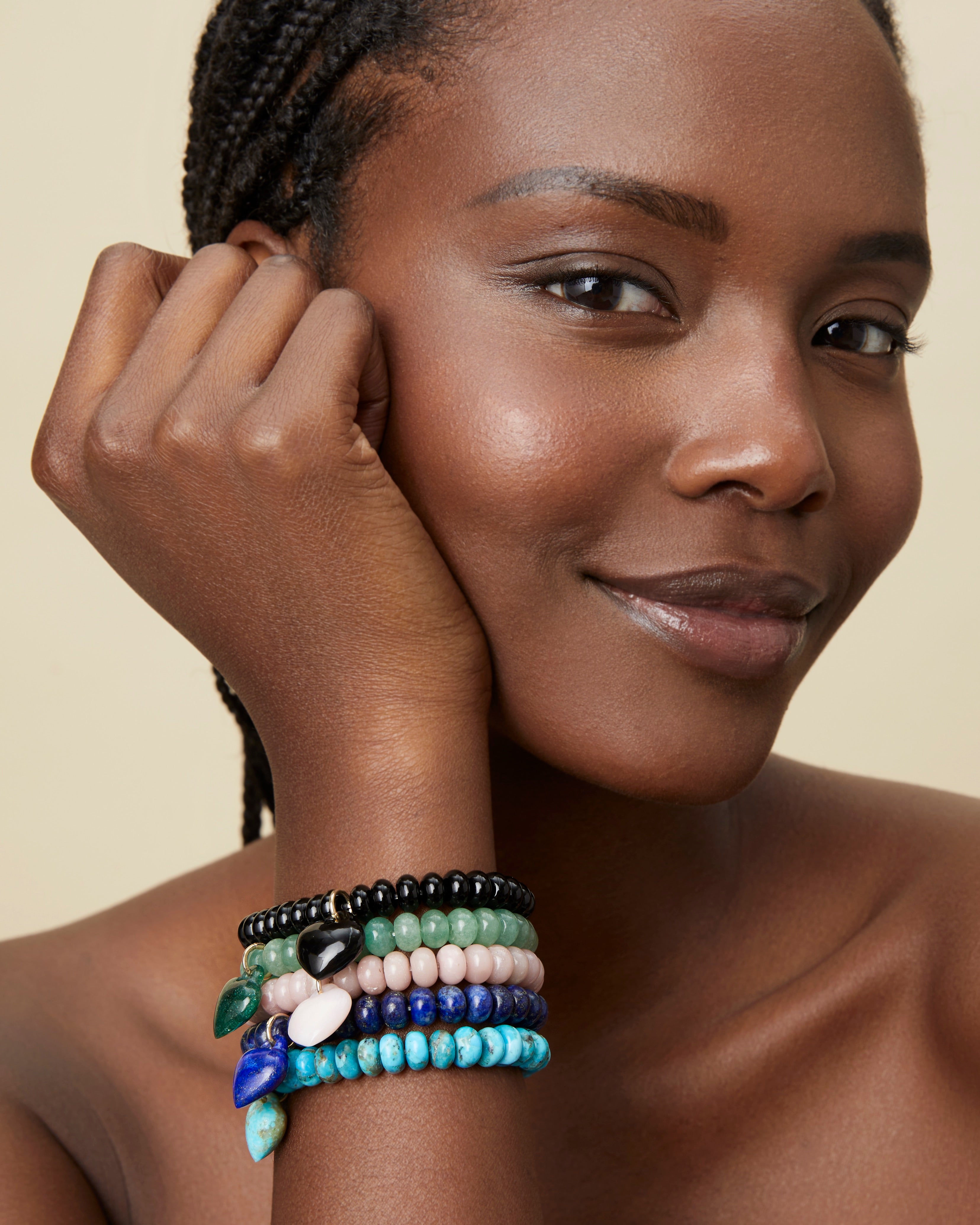 Rondelle Bead Heart Bracelets. This piece represents a stylish, elevated take on the beloved beaded stretch bracelet. Detachable puffy heart allows you to customize your look. 