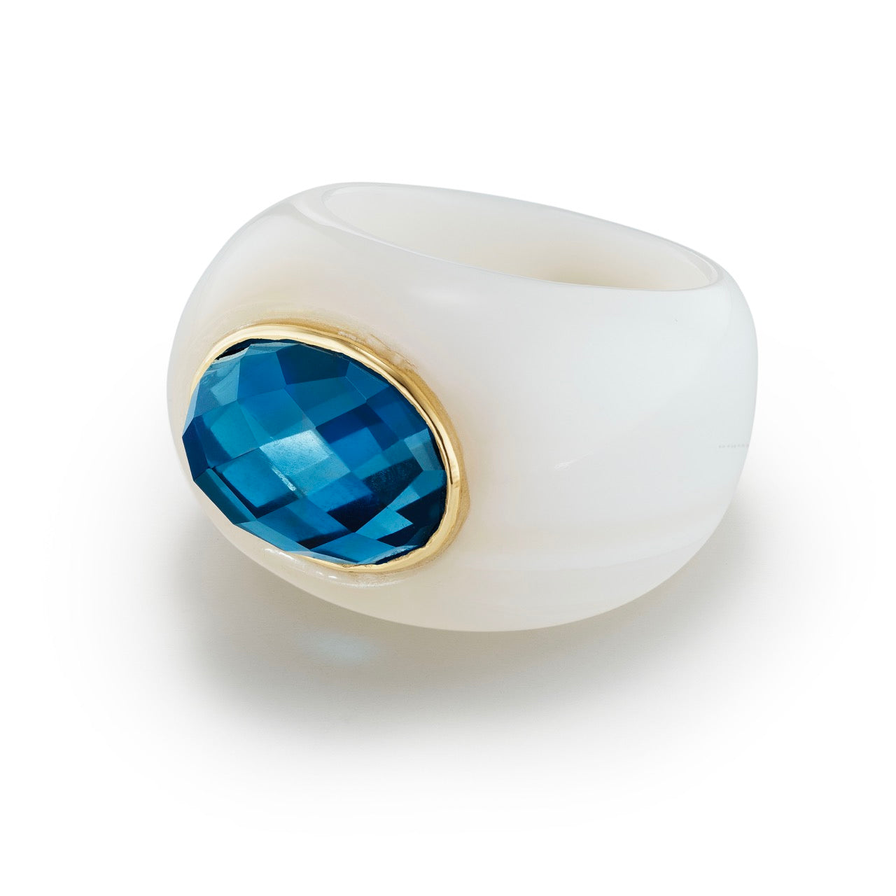 Sleek and sculptural, White Onyx gemstone ring highlights a rose-cut London blue topaz 