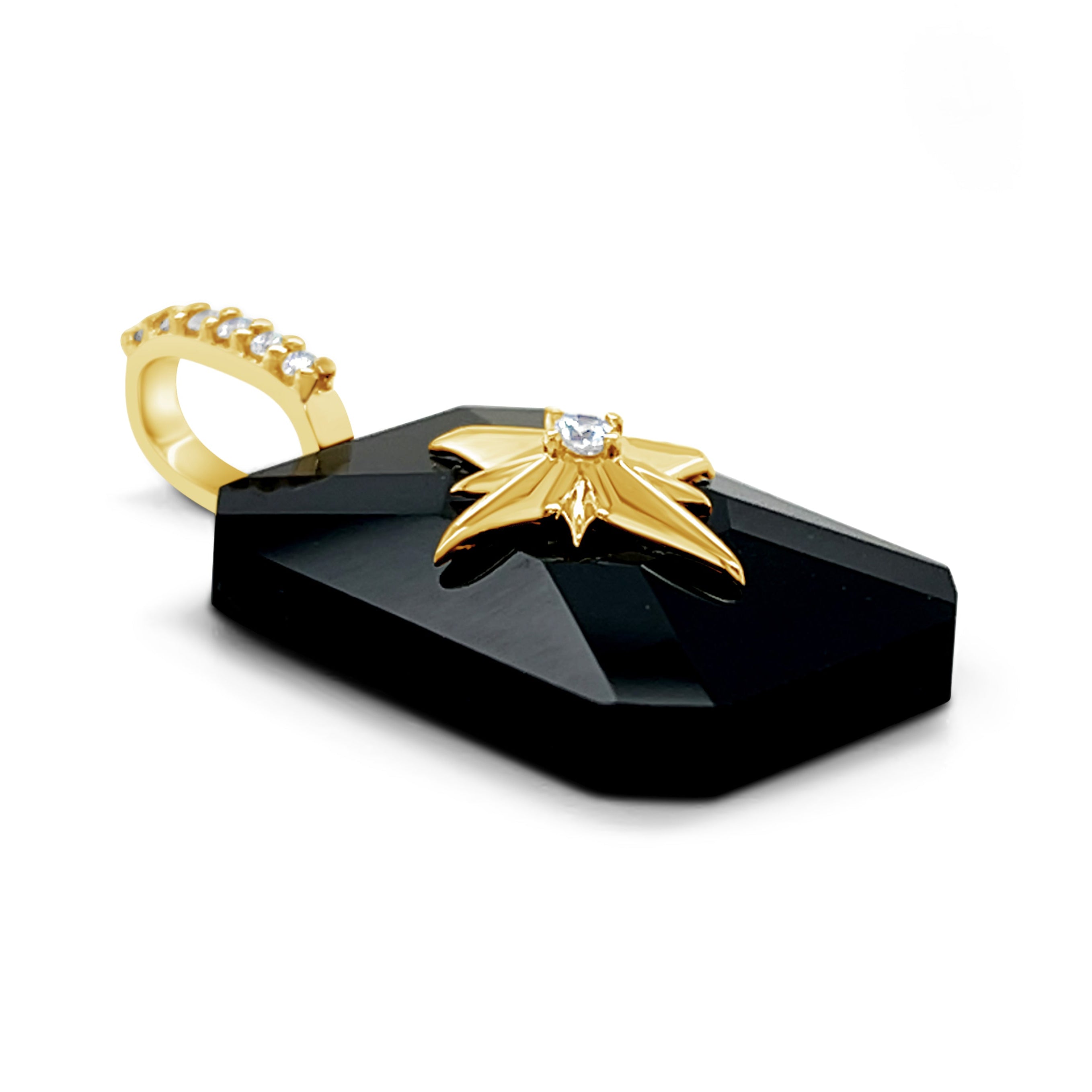 Side angle of Black Onyx cabochon pendant showing gold starburst