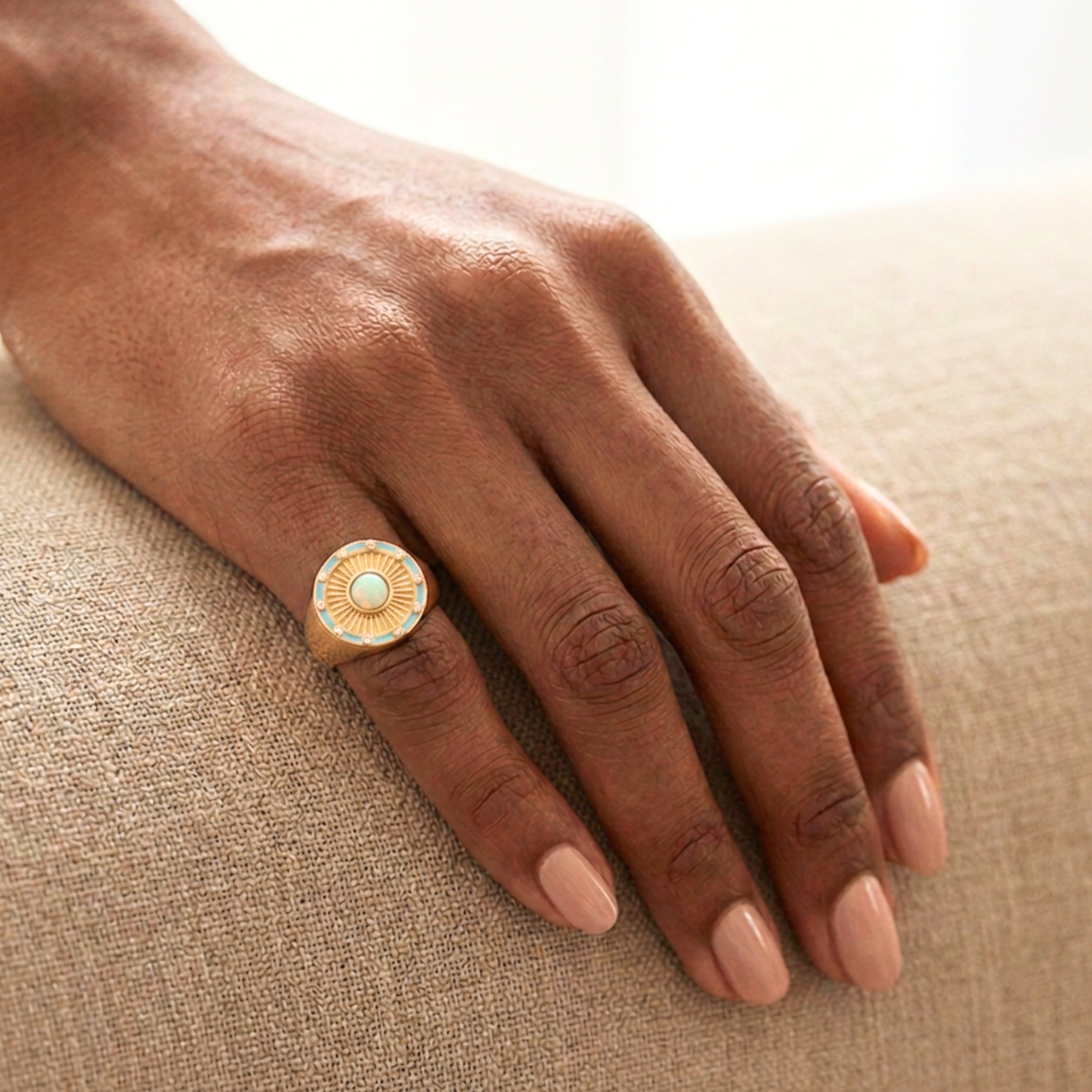 opal_sunburst_signet_ring-hand